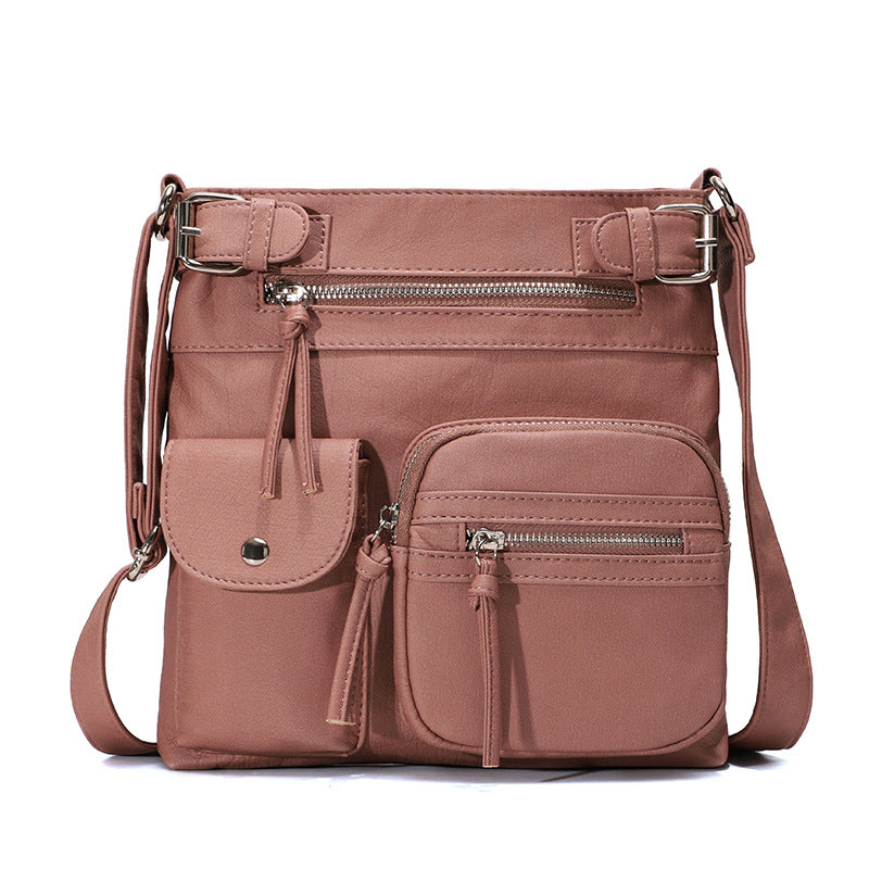 Blød crossbody taske med flere lommer