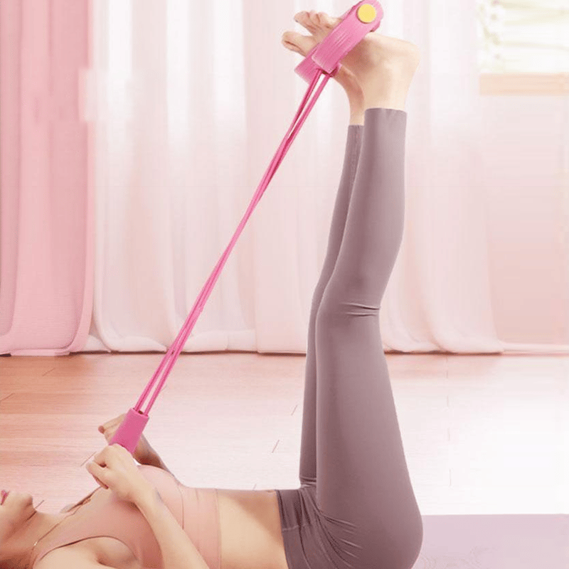 Modstandstræningsapparat med fodpedal og elastik til hjemmetræning