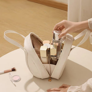 Skalformet kosmetiktaske i flere lag