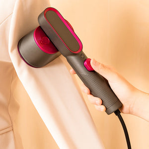 Bærbart håndholdt dampjern til vådt og tørt tøj