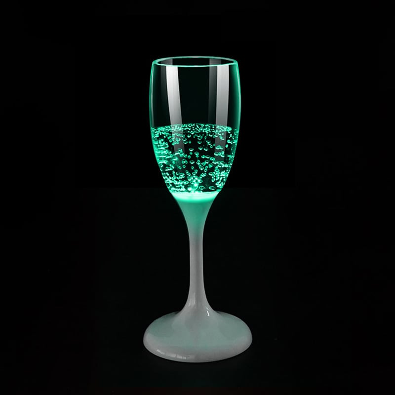 Lysende champagneglas