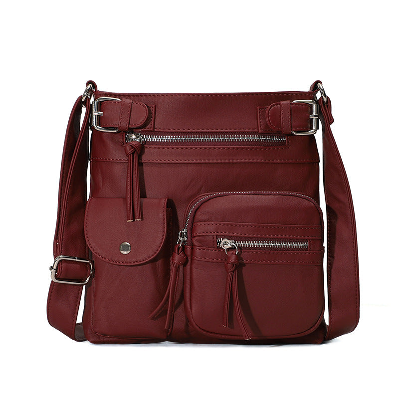 Blød crossbody taske med flere lommer