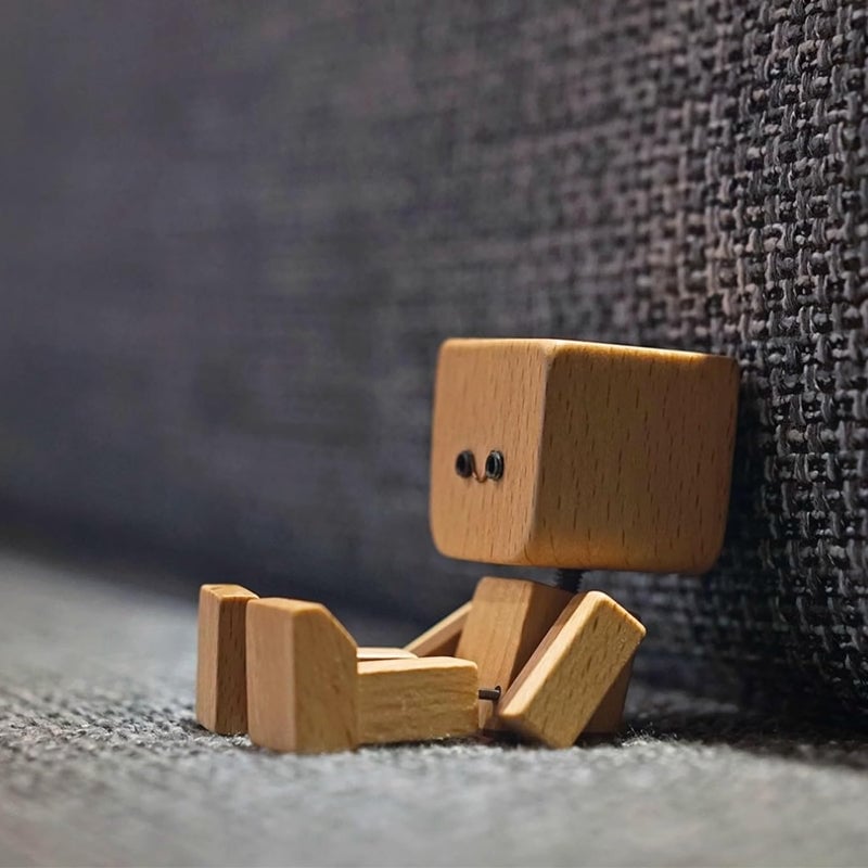 Rystende træmandsfigur