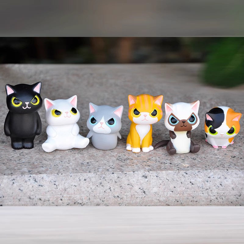 Dekorationer i katteforklædning