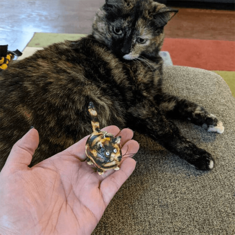 Miniature katteskulptur