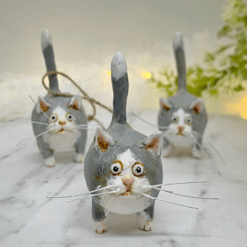 Miniature katteskulptur