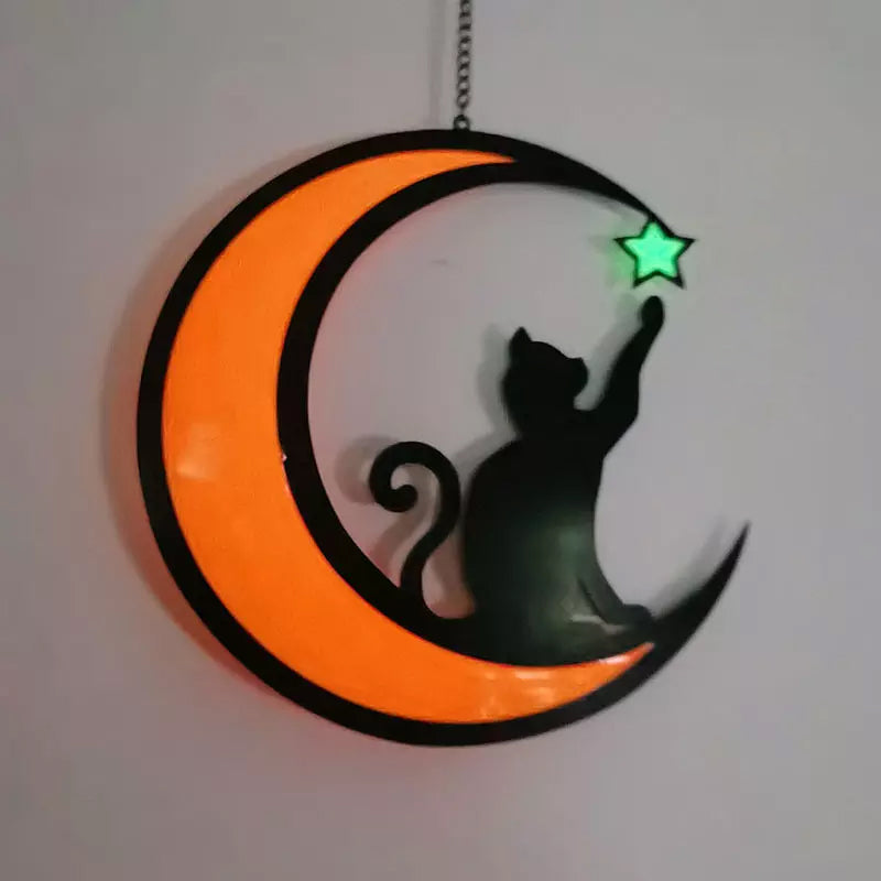 Dekorationer med måne og sort kat