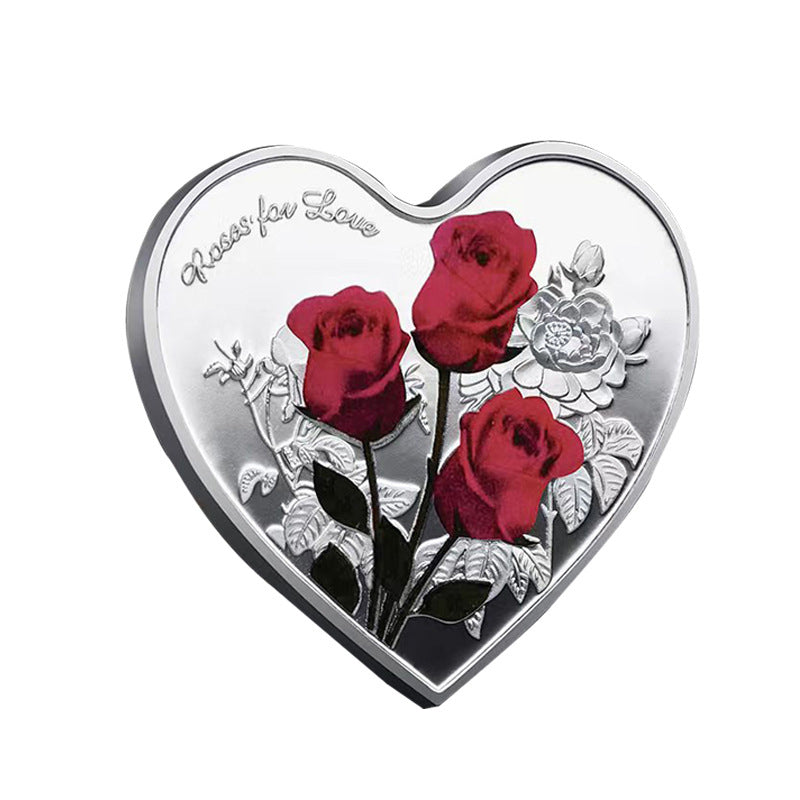 Hjerteformet mindemønt med rose