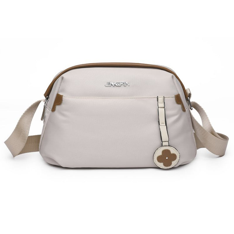 Crossbody taske med stor kapacitet